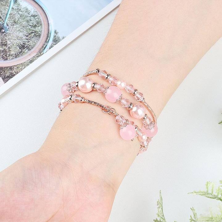 Immagine prodotto Cover-Discount Fitbit Versa 4 / Sense 2 - Bracciale con perle e strass rosa (Acciaio inossidabile)