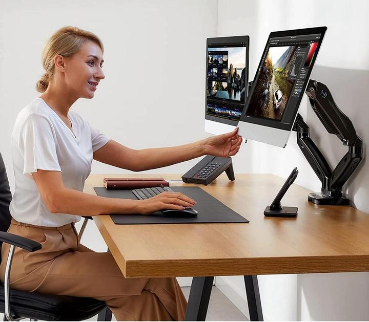 Immagine prodotto Techly Supporto da scrivania per 2 TV LCD LED 43-81cm 17-32inch morsetto a molla a gas nero (Tavolo, 32")