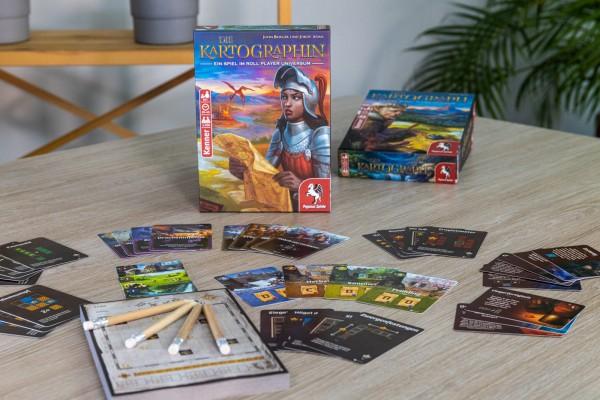 Actual product image Pegasus 51311G - The cartographer Ära der Helden, Card game, for 1-100 players, ages 10+ (DE edition) (German)