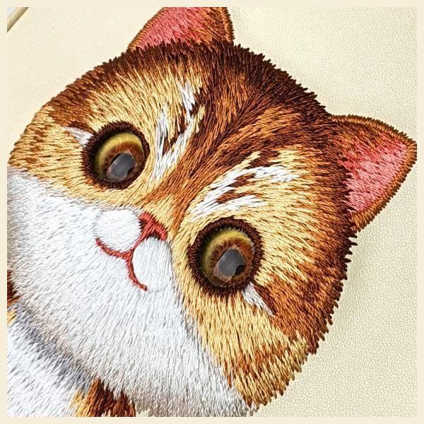 Actual product image Dell Nimmy phone bag khaki Big Eyed Pet 2.0 Cat