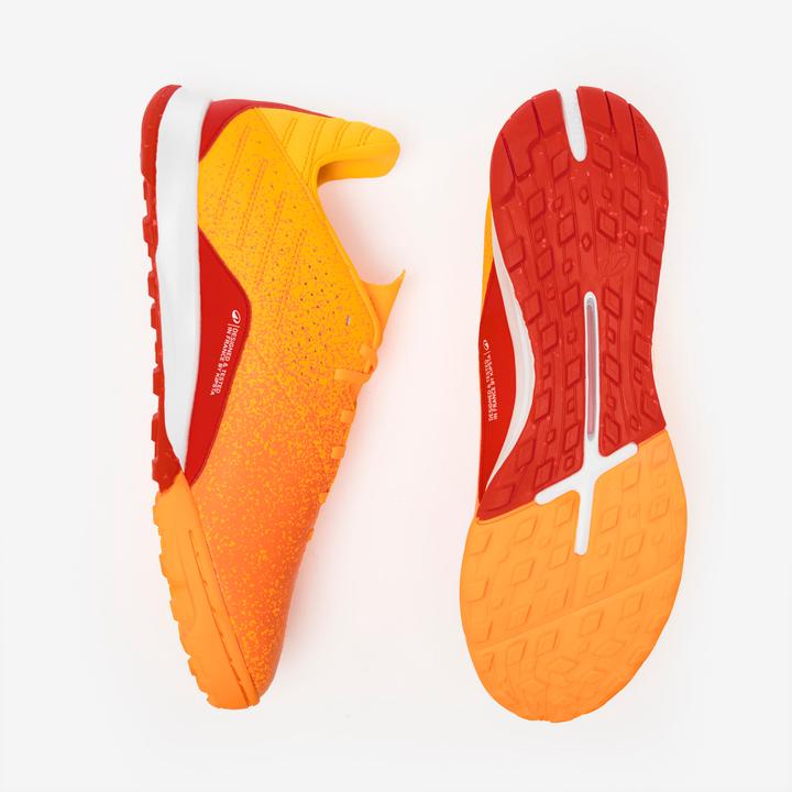 Immagine prodotto Kipsta Damen/Herren Fussball Multinockenschuhe Turf - Viralto I TF orange (42)