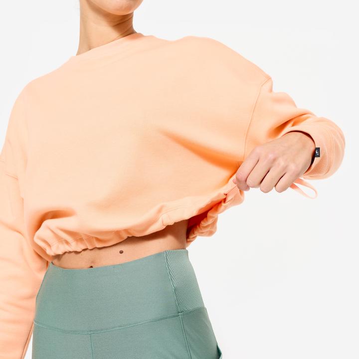 Produktbild Domyos Sweatshirt Crop Damen bequem dehnbar - pfirsich/orange (L)