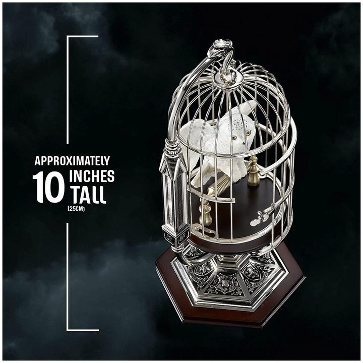 Productafbeelding Noble Collection Harry Potter miniatuur Hedwig in een kooi