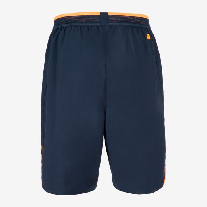 Immagine prodotto Kipsta Pantaloncini da calcio da donna/uomo - CLR blu navy/arancio (L)