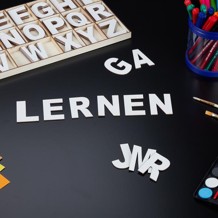 Actual product image Relaxdays 104-piece wooden letter set