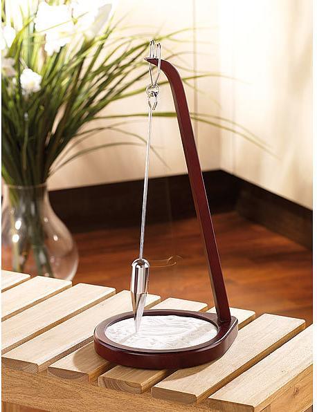 Immagine prodotto Infactory Pendolo a sabbia in legno/acciaio inox "Kerala (18,5 x 16,5 x 39 cm)