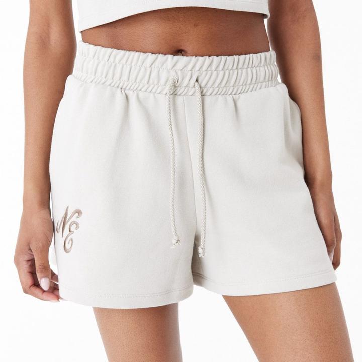 Immagine prodotto New Era Pantaloncini da donna in felpa stone beige - M (M)