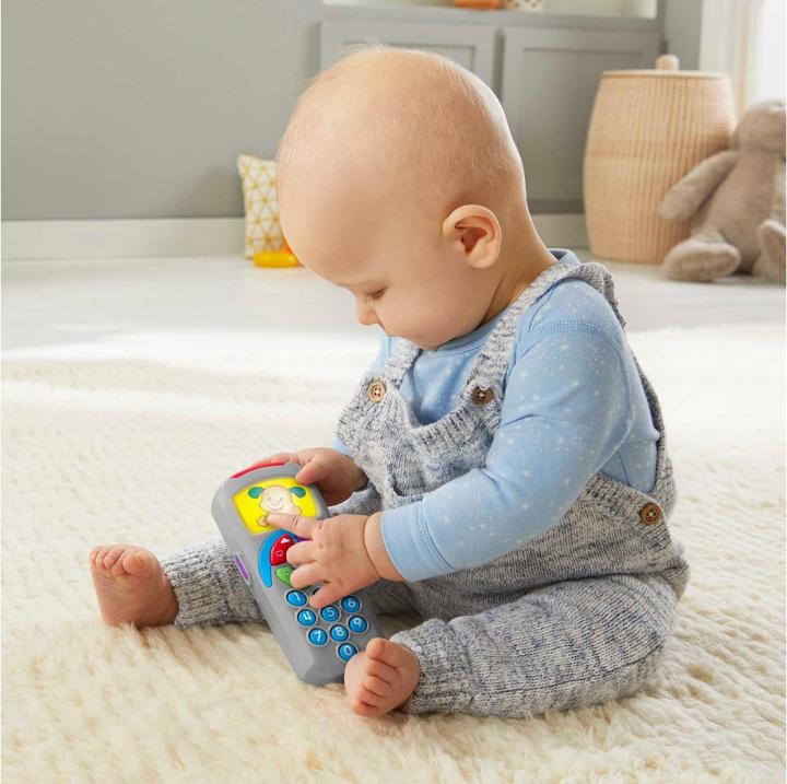 Actual product image Fisher-Price Learning fun doggie remote control educational toy for babies and toddlers with music and lights (German)