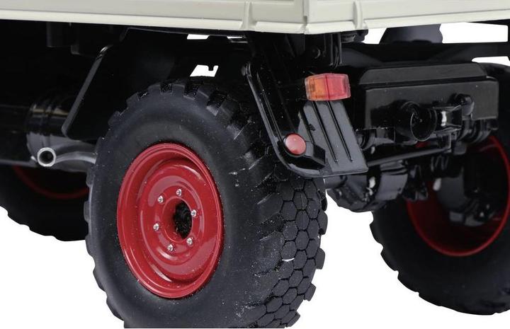 Produktbild Schuco MHI Unimog 406 grau 1:18