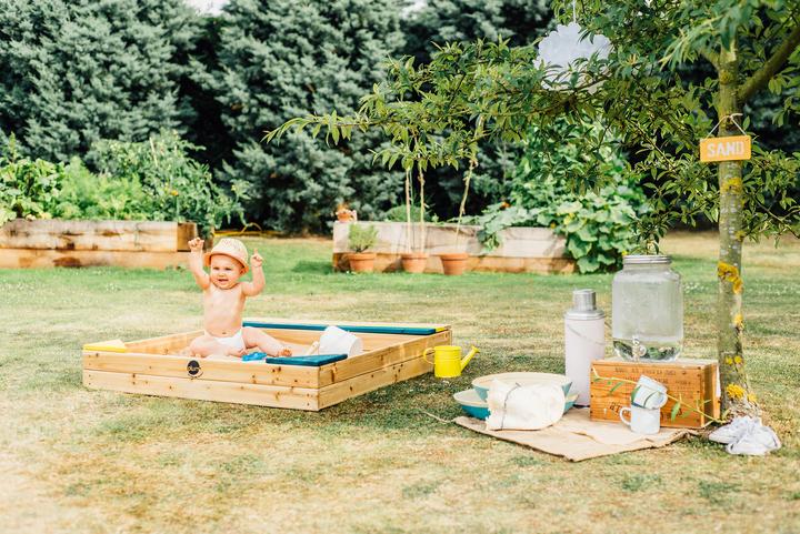 Actual product image Plum Play sandbox with storage compartment and protective cover