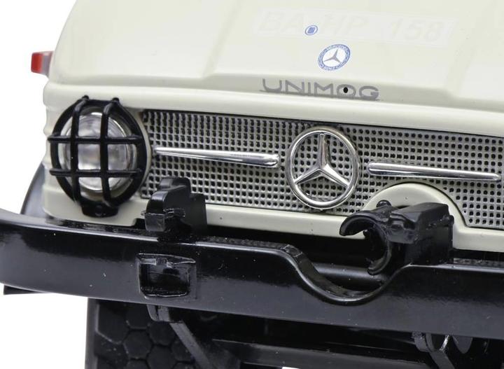 Produktbild Schuco MHI Unimog 406 grau 1:18