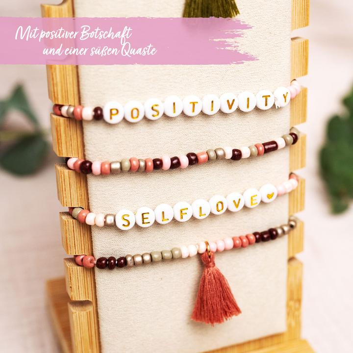 Produktbild Papierdrachen 4 Perlenarmbänder – POSITIVITY und SELFLOVE (Kunststoff, Gummi, Stoff)