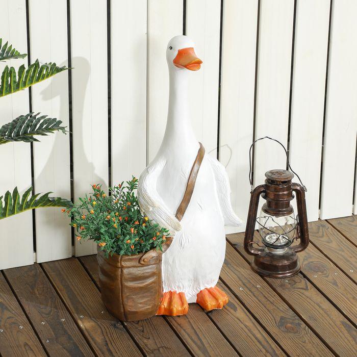 Immagine prodotto Swisshandel24 Vaso per piante con design "Cigno con cartella", fioriera con foro di drenaggio, per uso interno ed (18 cm)