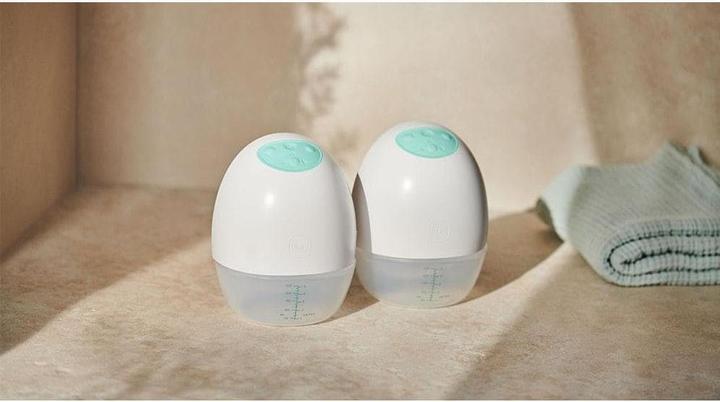 MAM Tire-lait double mains libres Move
