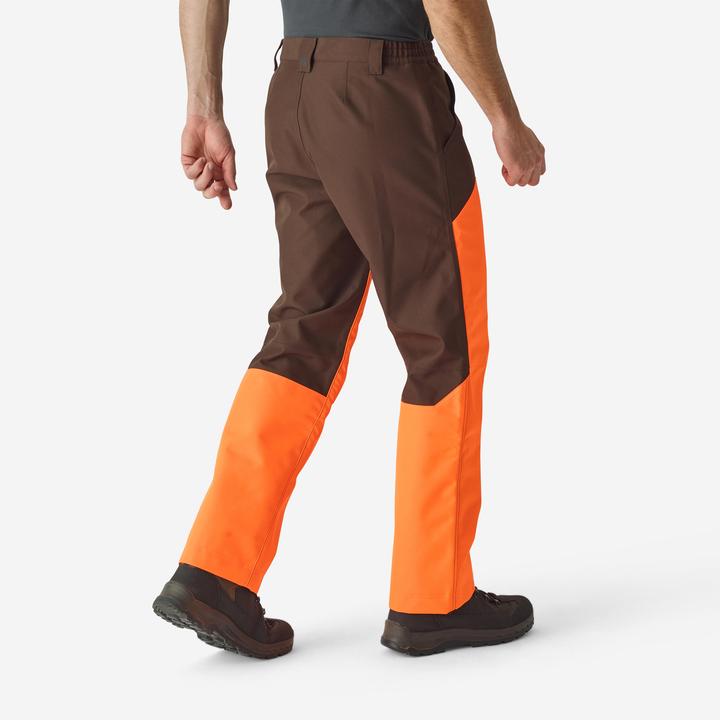 Image du produit Solognac Pantalon de pluie de chasse Renfort 500 orange/marron (XXL)