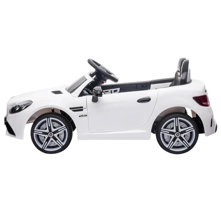 Immagine prodotto Swisshandel24 Auto elettrica per bambini, telecomando, cintura di sicurezza, musica, da 3 anni, bianco (12 V)