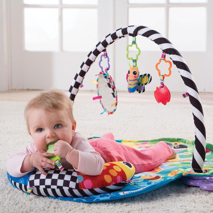 Produktbild Tomy Lamaze Freddie das Leuchtkäfer-Spiel
