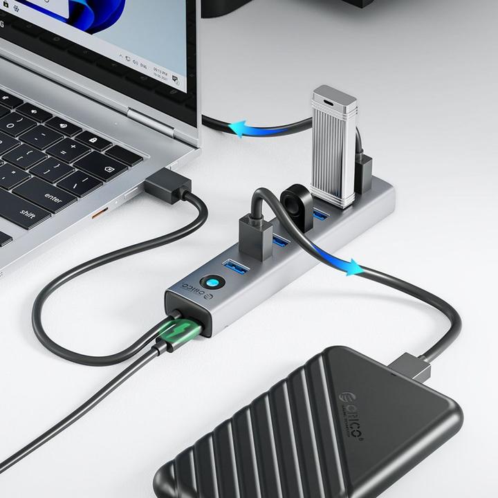 Actual product image Orico Converter CL7U-U3 hub 7x USB-A 3.0 + USB-C 5V/3A 1m - gray (USB-C, 7 Ports)
