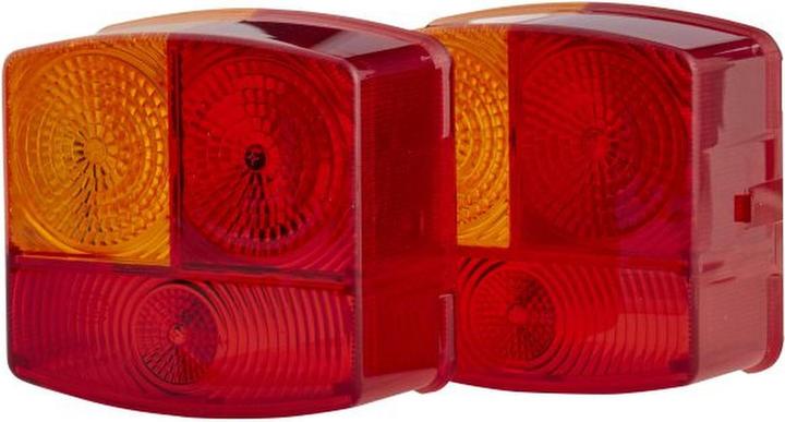Actual product image Hella 2 light discs rear light left halogen for DAF DEUTZ-FAHR JOHN DEERE (R10W)