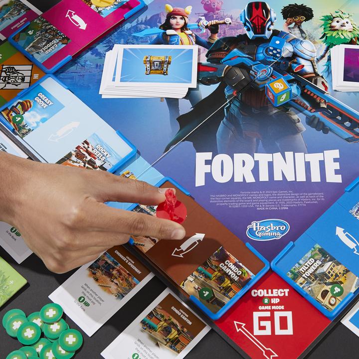 Immagine prodotto Hasbro Gaming Monopoly Flip Edition: Fortnite - gioco da tavolo dai 13 anni in su, Monopoly ispirato al videogioco