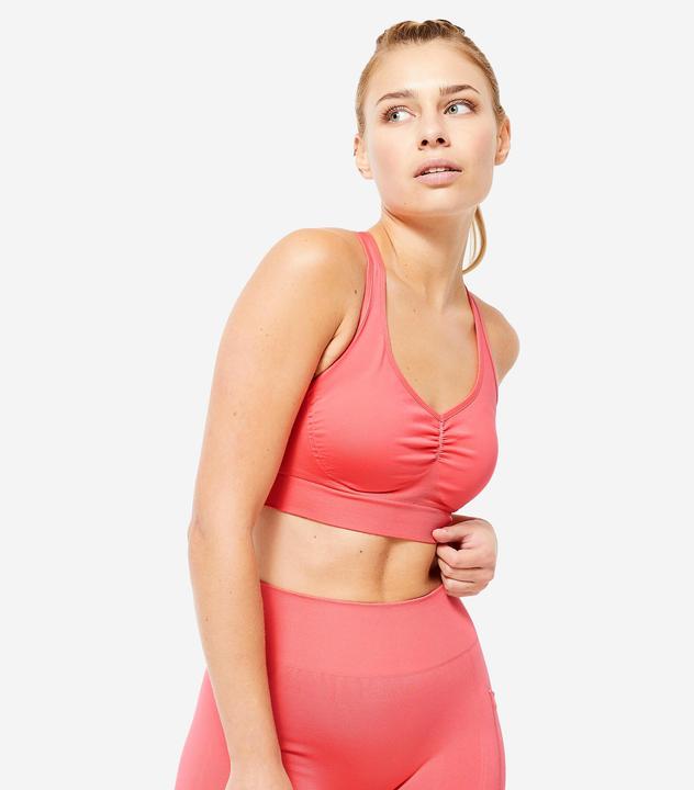 Immagine prodotto Decathlon Reggiseno sportivo leggero con spalline incrociate - rosa (S)